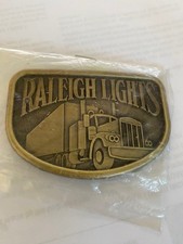 Vintage 1981 Raleigh Lights Western Cowboy Metal Belt Buckle Semi Truck brass