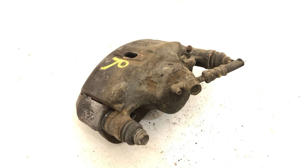 Pinza de freno delantera derecha Toyota Camry 1986 pasajero con soporte de montaje OEM Foto 4 de 4