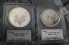 1986S & 1990S American Silver Eagles PF69 Mercanti (Lot Of 2)- Slightly Toned ?