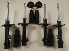 Satz 4 Gasdruck Stoßdämpfer Nissan X-Trail T30 Domlager Staubschutz vorne hinten