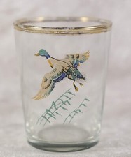 1  shot sherry  glass featuring a flying mallard just over 2