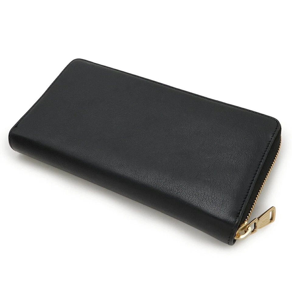 Бумажник женский Yves Saint Laurent кожаный на молнии черный один размер - Изображение 2 из 4