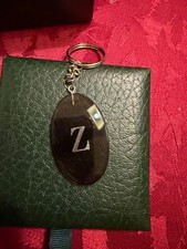 personalized initial letter 'Z' keychain featuring a brown natural oval pendant