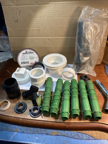 Sioux Chief 2 in. Dia. PVC Shower Drain & Other Plumbing Supplies Lot (23)
