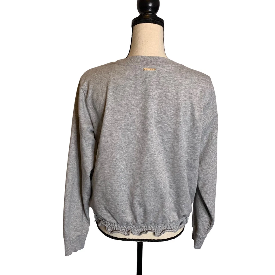 Blusa Michael Kors Mujer Grande Gris Recortada Manga Larga Elástico Volantes Cintura Foto 4 de 4