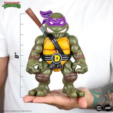 Tortugas Ninja – Donatello Figura Transformable De Mascota A Ninja, Con Accesorios Y Base De Exhibición, Famosa