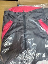 women's sz large new light weight track suit NEW IN PACKAGE