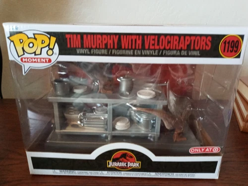 Tim Murphy with Velociraptors Funko pop