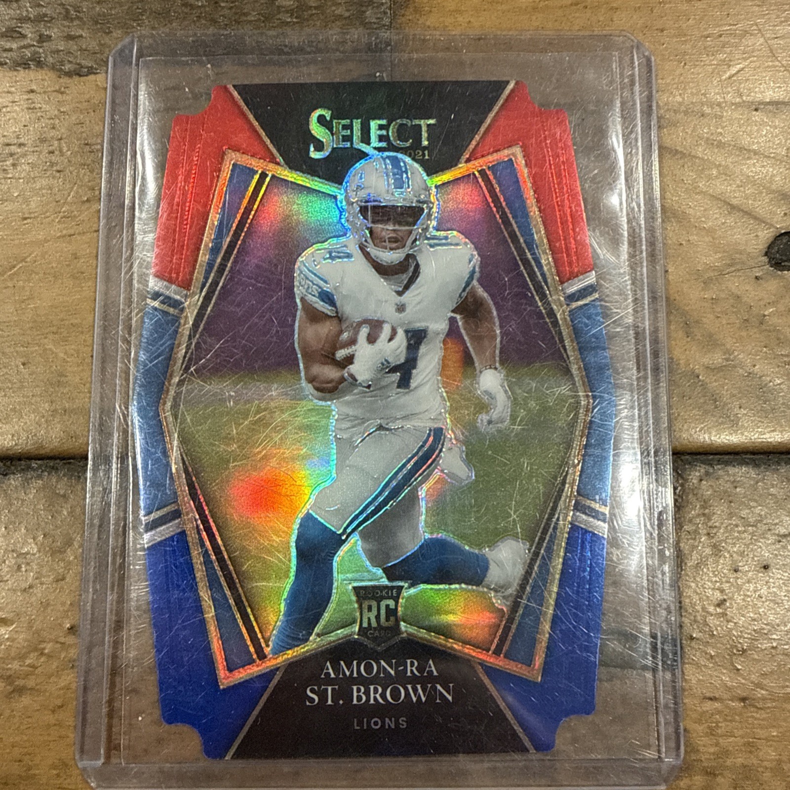 Amon-Ra St. Brown 2021 Panini Select Premier Level Rookie Die-Cut Red & Blue RC 