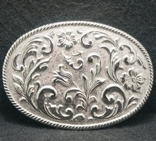XF27175 AMAZING VINTAGE 1970s FLORAL ARTWORK UNISEX SILVERTONE BELT BUCKLE