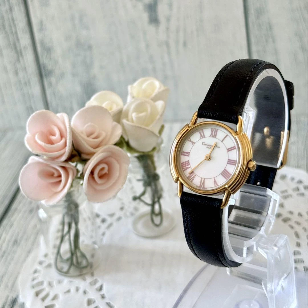 Montre analogique femme Christian Dior coque ronde rare boîtier doré noir 24 mm occasion