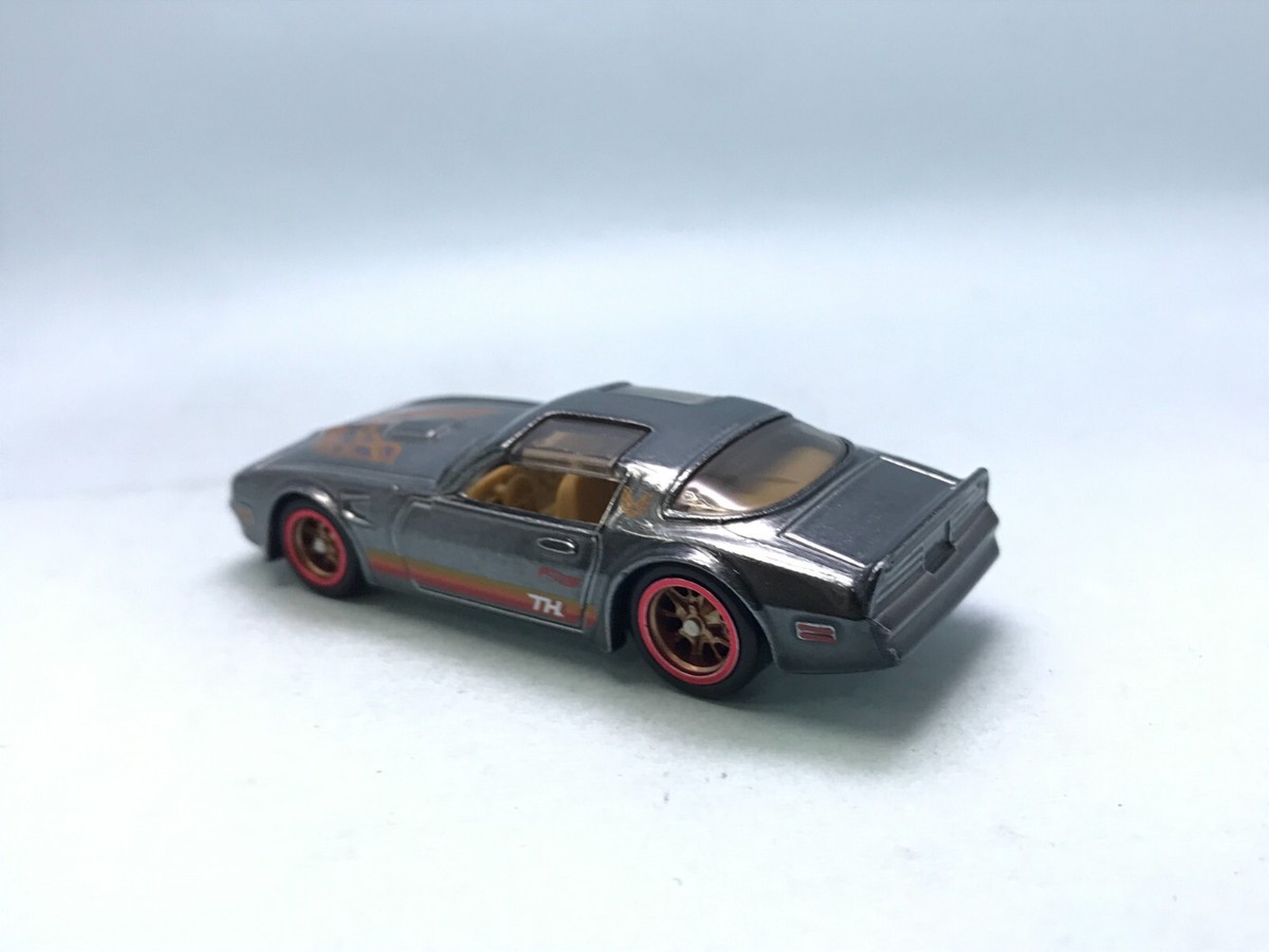ミニカー Hotwheels STH 77 Pontiac Firebird Amazon.com: Hot Wheels '77 Pontiac Firebird T/A - Easter 5/5