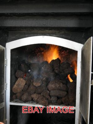 PHOTO  ISLAY PEAT FIRE FOR SMOKING THE MALT AT LAPHROAIG DISTILLERY