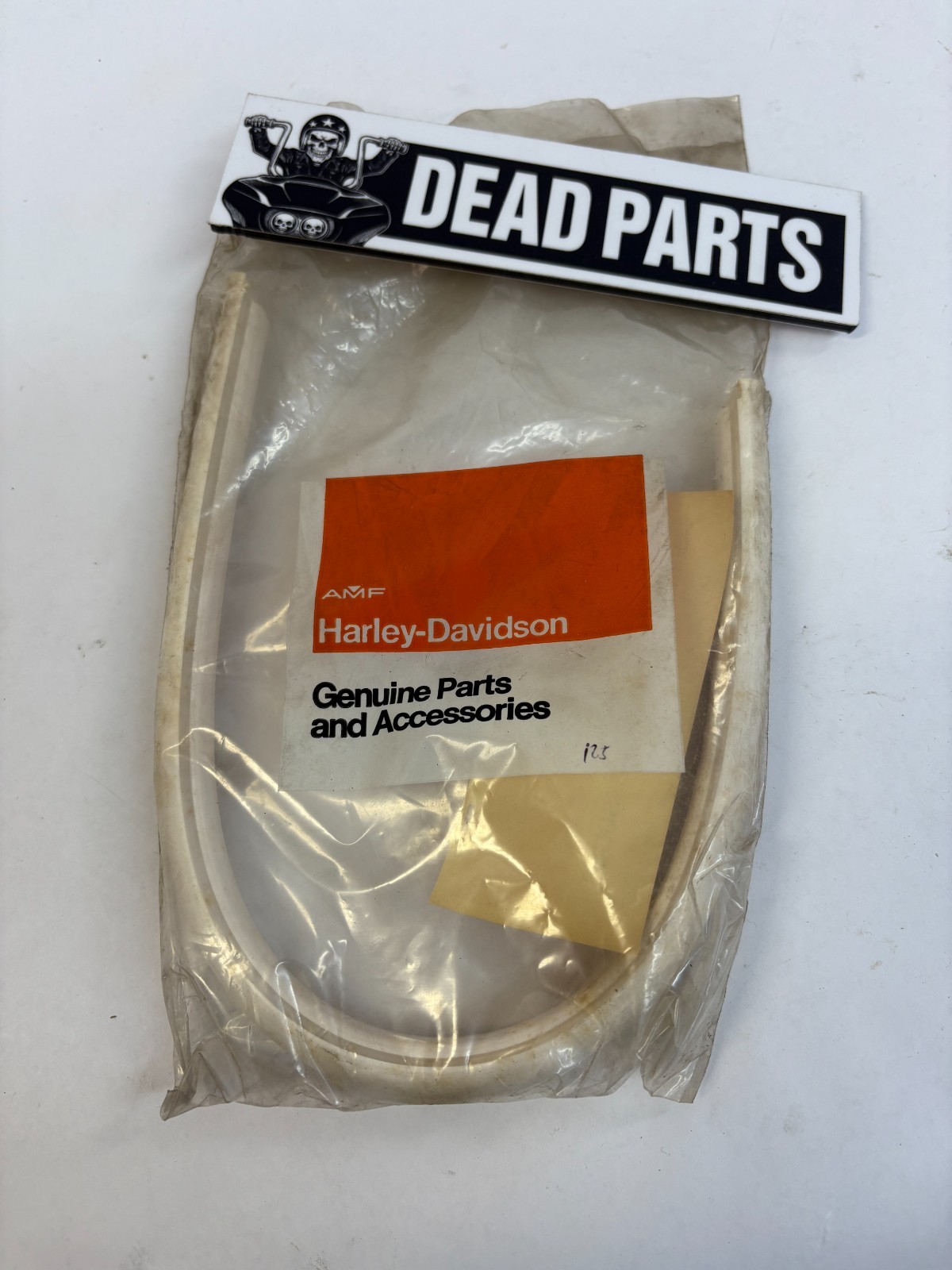 Harley NOS OEM white bumper trim accent strip 91081-68