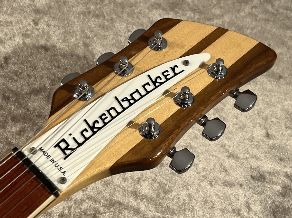 Rickenbacker 360 MG Mapleglo 1993 with silver hardware, made in U.S.A. on textured light wood head.