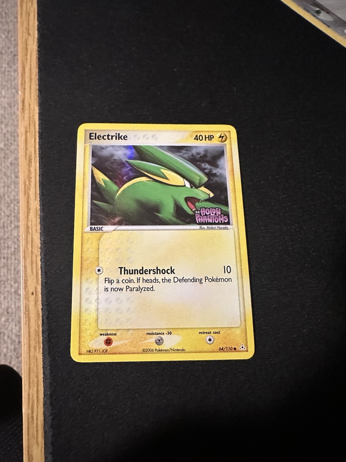 Electrike 64/110 Pokemon Card Reverse Holo EX STAMPED Holon Phantoms NM