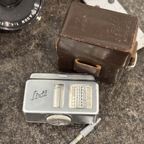 Cámara SLR Exakta VAREX VX 35 mm década de 1950 con 3 lentes y extras Carl Zeiss Jena LIMPIA - Imagen 14 de 24