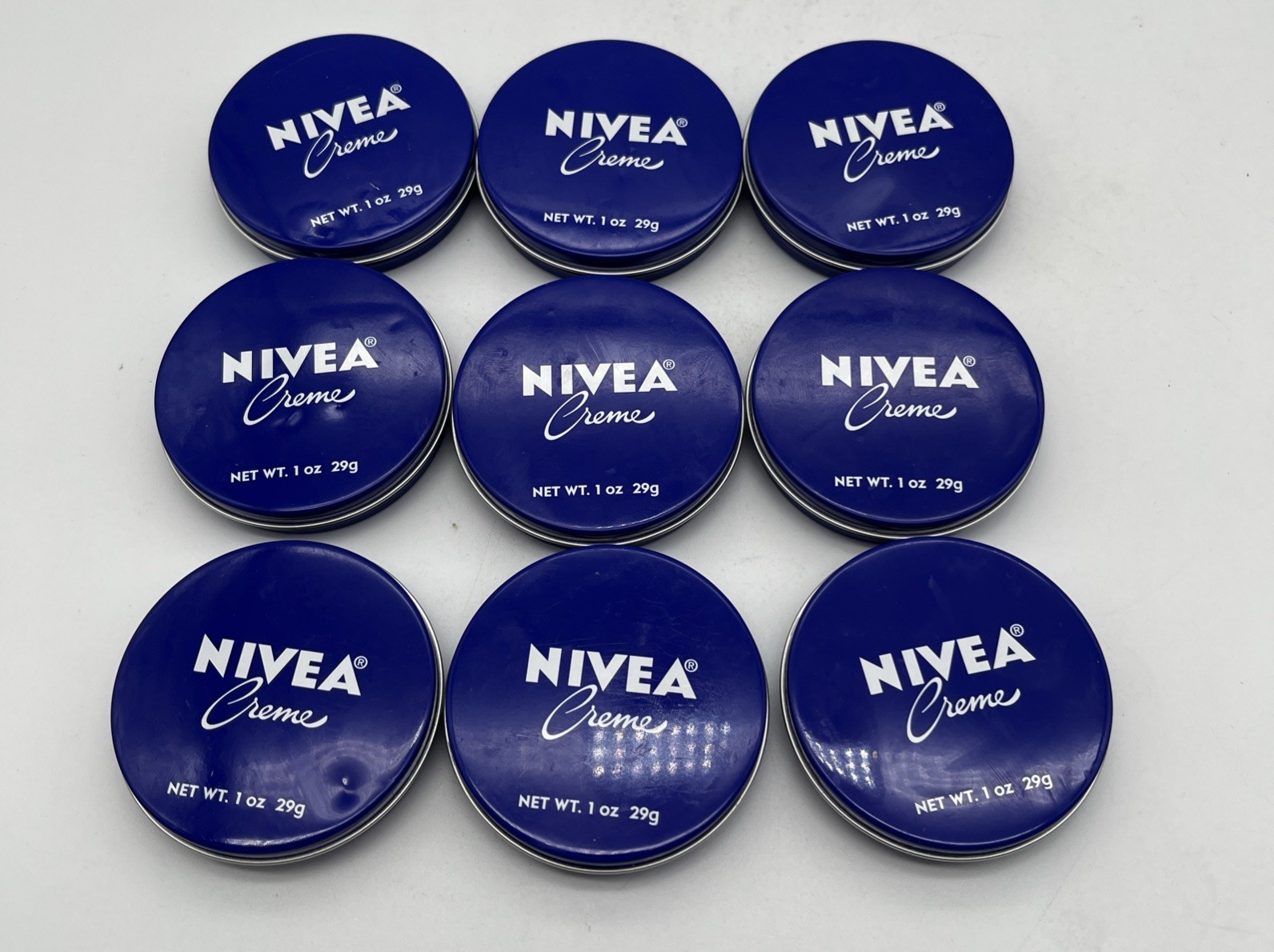 9 pack ~NIVEA CREME SKIN MOISTURIZING 1 OZ TIN HAND BODY TRAVEL SIZE CREAM