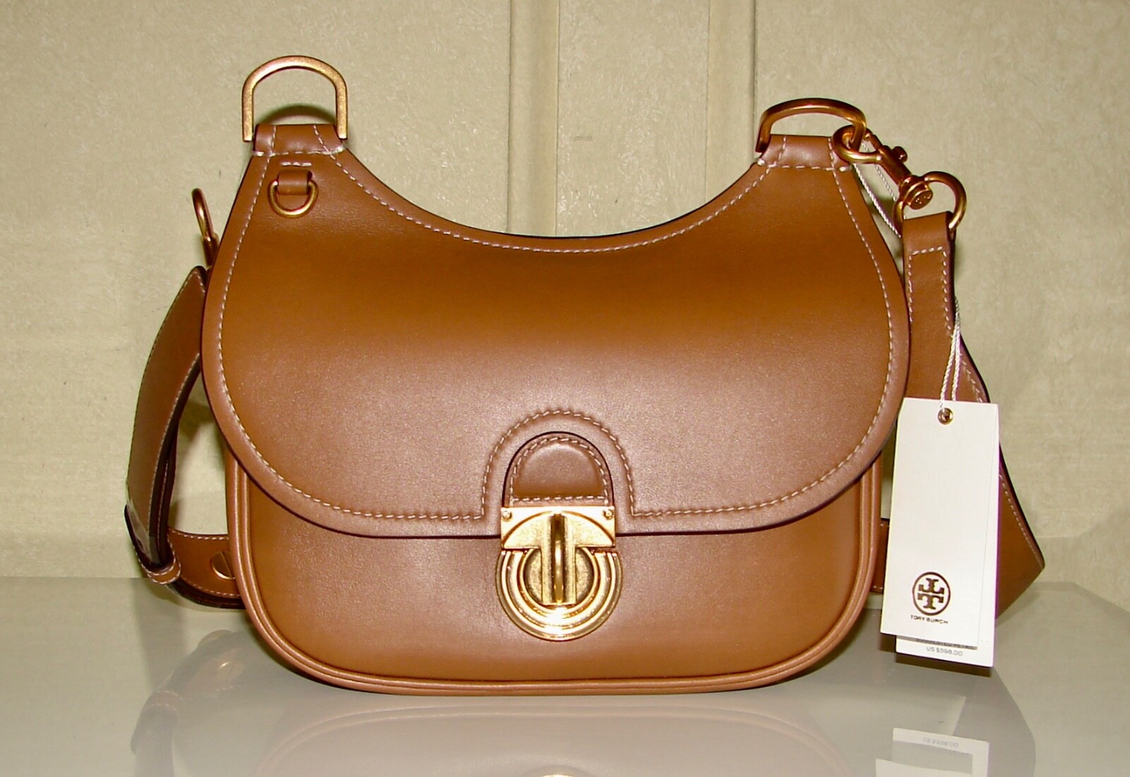 tory burch james saddle bolsa