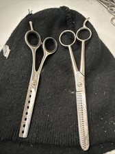 Two pair of haircutting scissors Fromm And Hoffritz BIN 3 BAG
