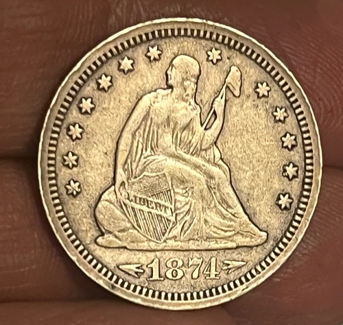 1874-s  seated Liberty quarter,  VF / EF , scarce date !