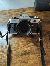 UNTESTED Canon AE-1 Program 35mm SLR Film Camera W/ FD 50mm 1:1.8 Lens