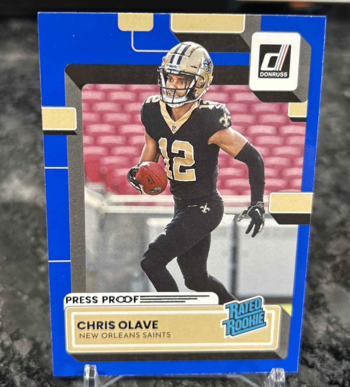2022 Panini Donruss - Rated Rookie Chris Olave #309 Press Proof Blue (RC)