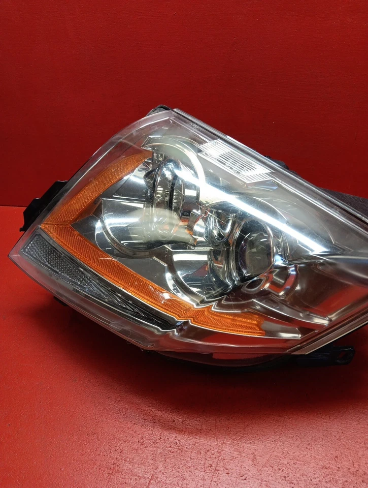 Lámpara halógena de faros de conductor izquierda TYC mercado de accesorios para Cadillac CTS 2008-2014 Foto 2 de 4