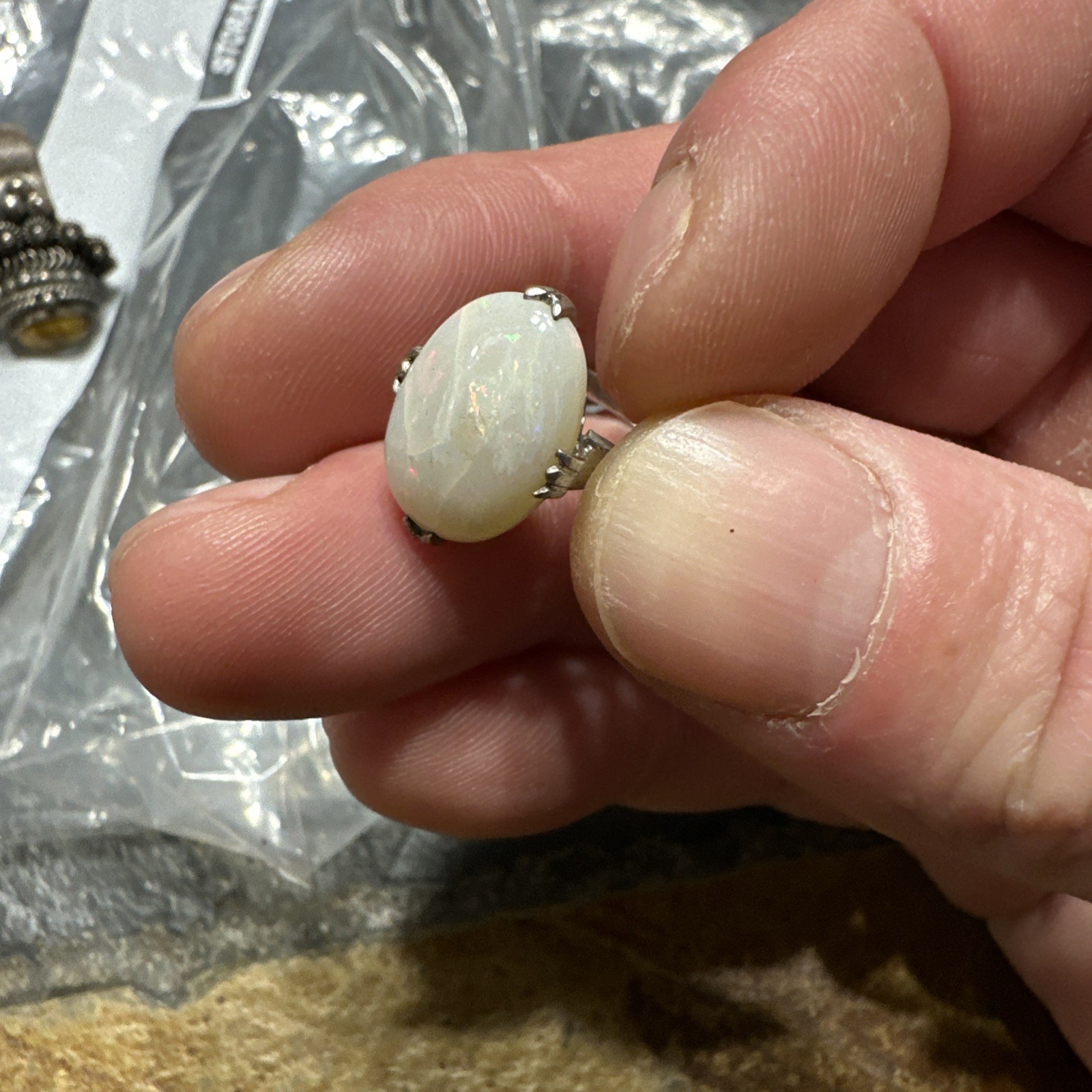 Silver Ring Featuring A Large Oval White Opal - image 2