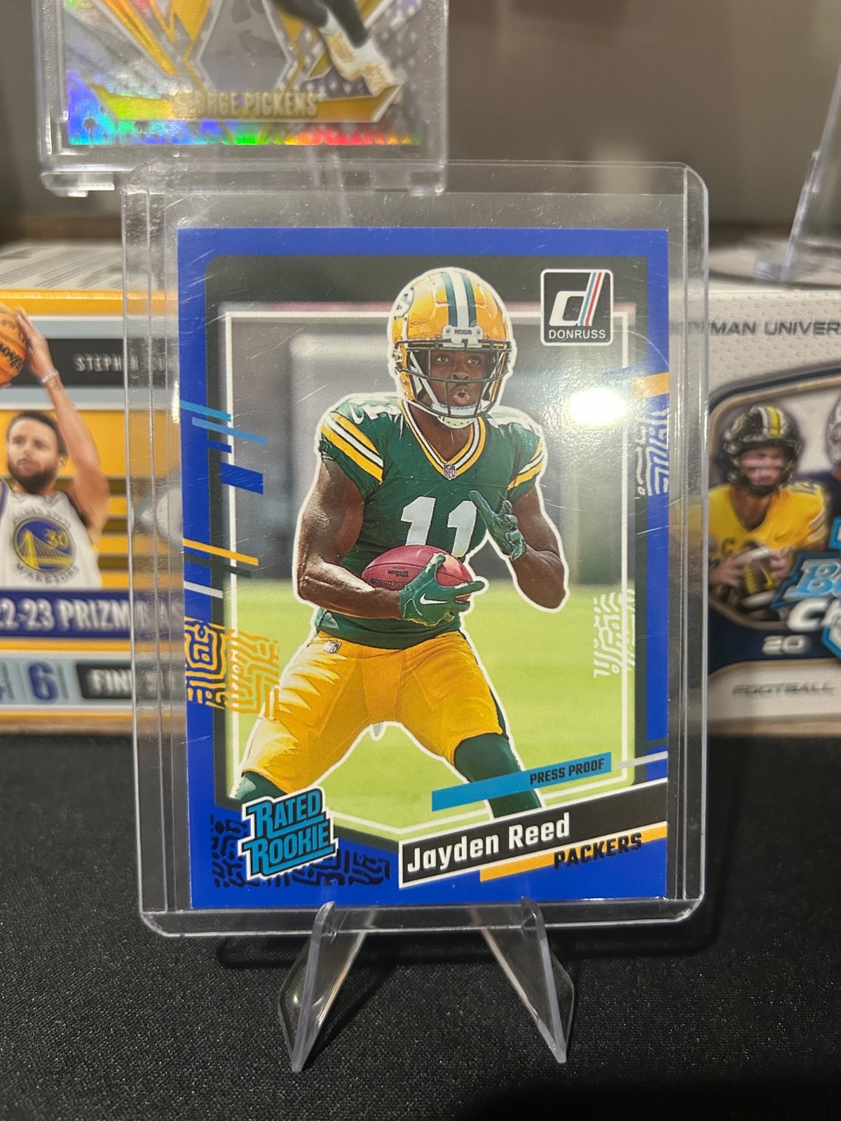 2023 Panini Donruss - Rated Rookie Jayden Reed #334 Press Proof Blue (RC) Packer