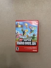 New Super Mario Bros. Wii (Nintendo Wii 2009) Complete with Manual & Inserts
