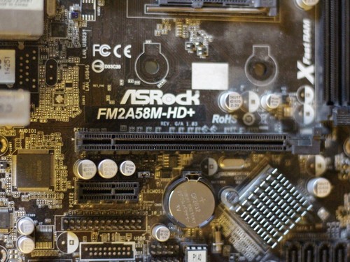 Placa madre ASRock FM2A58M-HD+ 1.03 Socket FM2+ VGA DVI HDMI Audio funcionando - Imagen 11 de 12