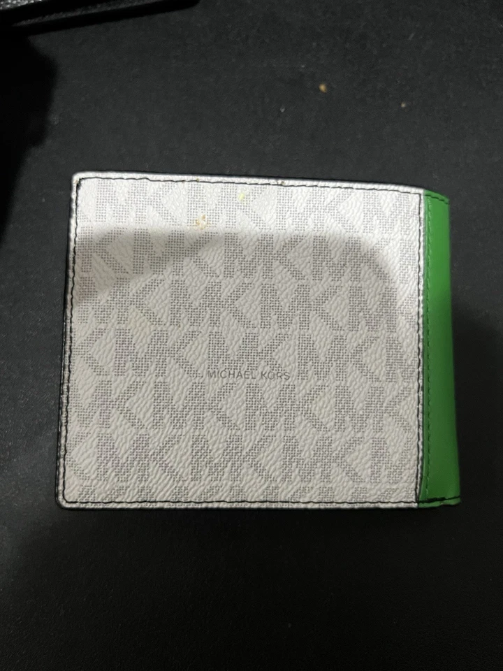 Billetera delgada Michael Kors con logotipo de cobre Foto 2 de 4