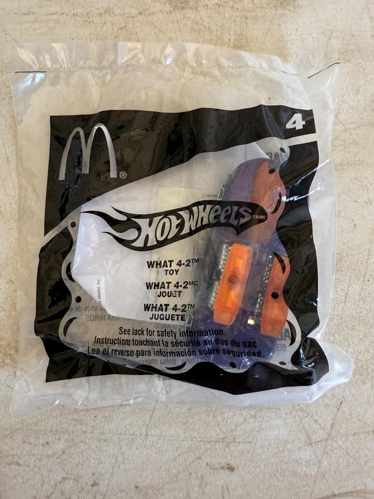 BRAND NEW McDonald's 2006 HOT WHEELS Mattel  Toy # 4 - WHAT 4-2