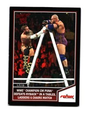 2013 Topps Best of WWE WWE Champion CM Punk Defeats Ryback in a Tables 77