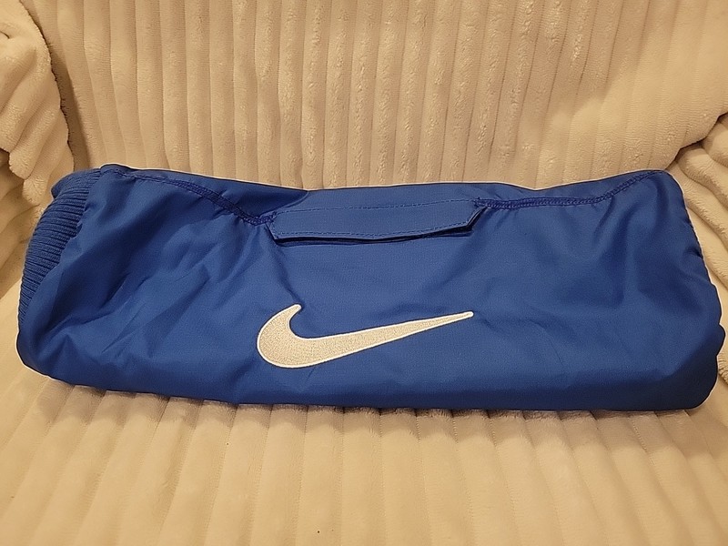 New Seasonal Shelf Pull Nike Football Hand Watmer With Small Top Pocket.