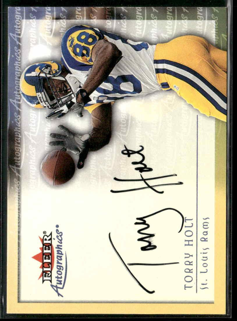 Torry Holt #NNO 2000 Fleer Tradition Football Genuine Coverage