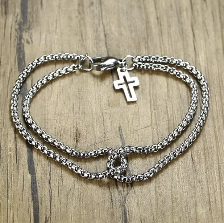 Rolo chain bracelet on sale with cross charm