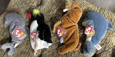 TY Beanie Babies Echo Dolphin, Slippery Seal, Frigid Penguin, And Paul Walrus