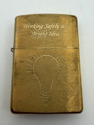 Vintage 1997 Working Safely Is A Bright Idea Brass Zippo Ziplight New