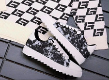 Size 8 - Men's Black/White Camouflage Low Top Lace-Up Sneakers
