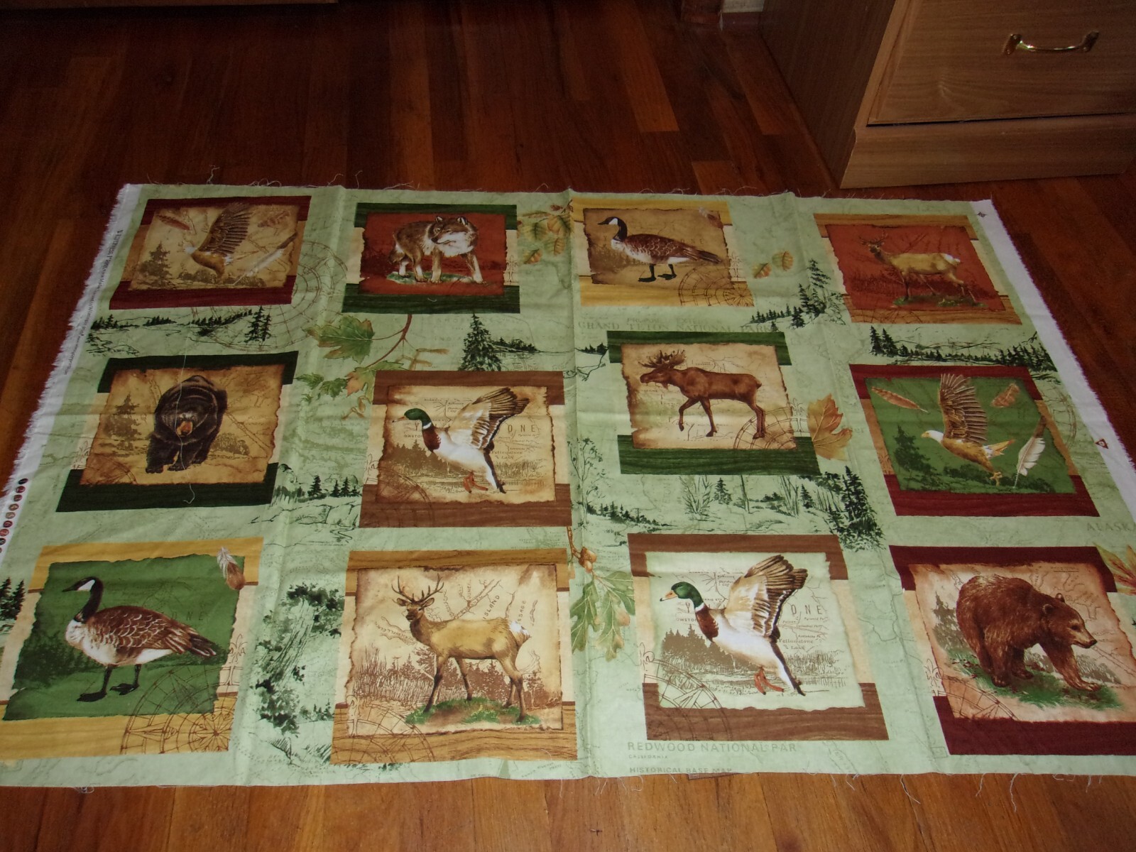 Wildlife pillow quilt lap robe panel with Wilmington prints Wilderness Park design