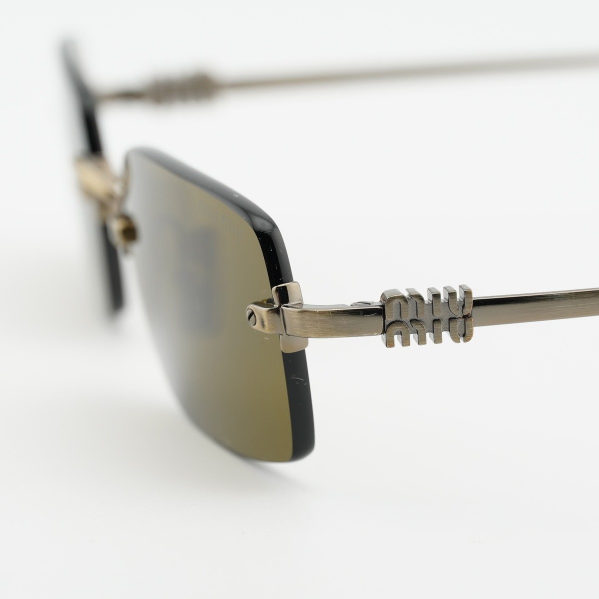 Miu Miu MUB50S 26C09Z Sunglasses Gold Rectangle Frame, Brown Lenses Miu Miu MUB50S Sunglasses 26C09Z Old Gold - eye-oo.com main image 4