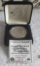 The Highland Mint Sports Collection  .999 Silver Coin Denver Broncos John Elway