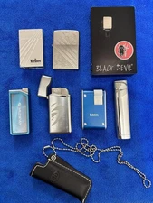 Zippo Lighter and Cigar Case Set Eight Piece Black Devil Tobacco Cases Used