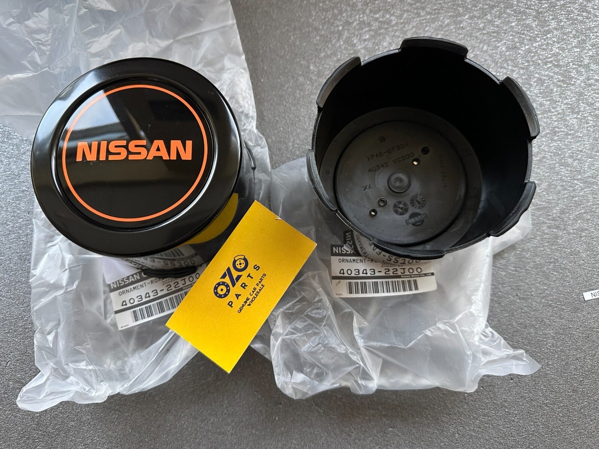 Genuine Nissan Patrol Y60 rear wheel hub center caps 4034322J00 | eBay