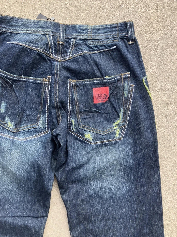 Pantalones de mezclilla desgastados con retazos para hombre 27 vintage lavado diseño único puntada gruesa Foto 4 de 4