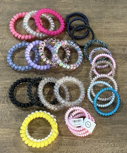 26 Teleties Hair Ties Free Shipping new and excellent condition