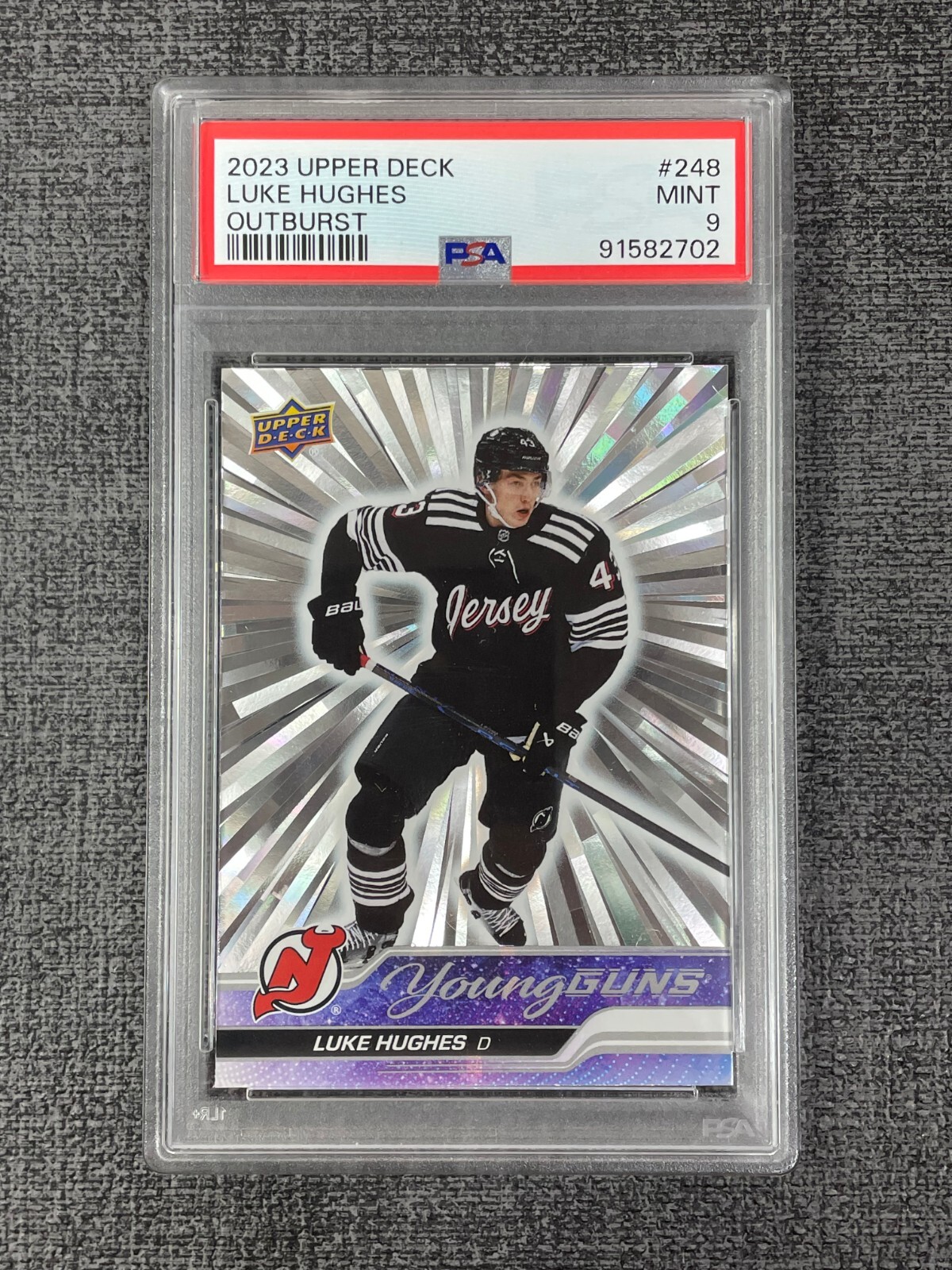 Luke Hughes 2023-24 Upper Deck Series 1 Young Guns Silver Outburst RC #248 PSA 9