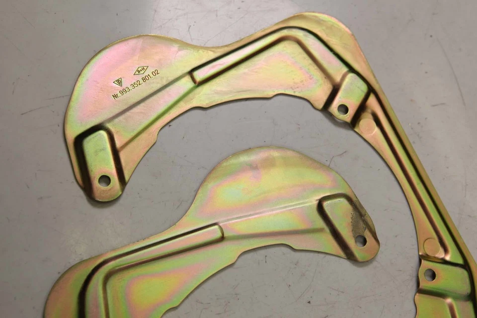 95-98 Porsche 911 993 Protectores antipolvo de freno Placas protectoras traseras 99335280102 G6 Foto 3 de 4